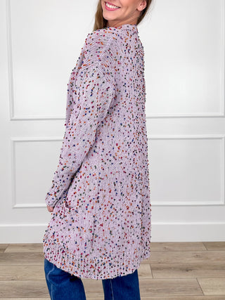 Knit long-sleeve cardigan with open front, speckled purple, pink, and white yarn