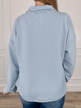 Blue-and-white striped long-sleeve half-zip sweatshirt, back view with half zipper