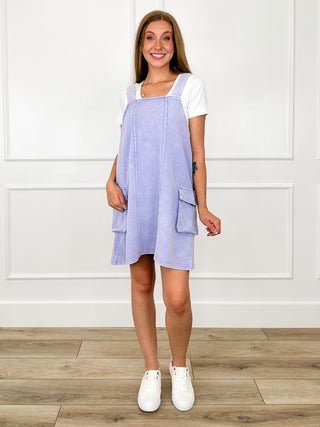 Light blue cotton-blend overall dress with side pockets and short overall length