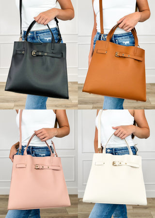 Faux leather tote bag in multiple colors, with front buckle strap and top handles