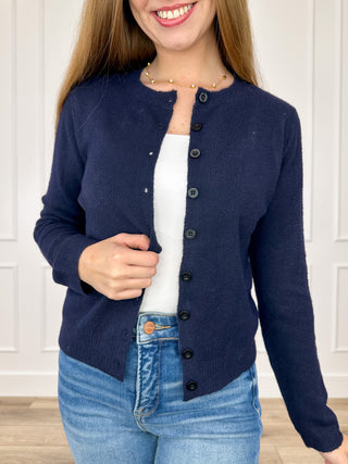 Navy long-sleeve knit button-up cardigan with front dark buttons