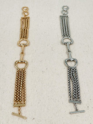 Gold and silver chain drop bracelet with rectangular charm bar and clasp rings