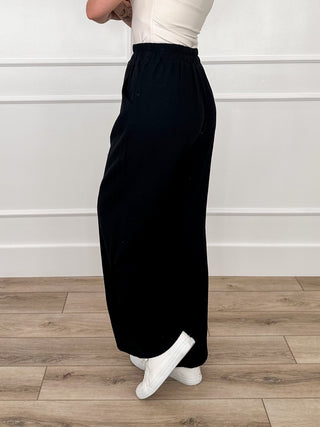 High-rise lightweight pants in black, pull-on elastic waistband, ankle-length