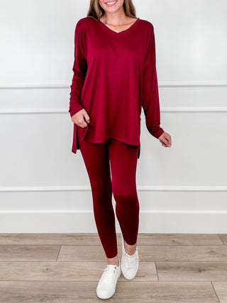 High-rise cropped leggings set in wine red with long-sleeve tunic and fitted leggings