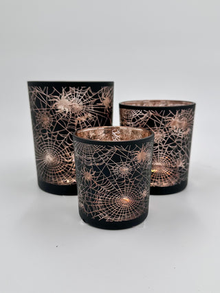 Set of 3 black glass candle holders with gold spiderweb and starburst patterns