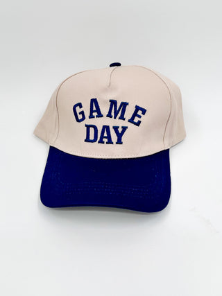 Game Day embroidered hat with beige crown, navy brim, and navy “GAME DAY” stitching