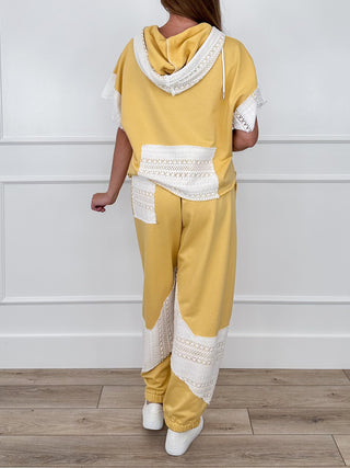 Yellow hooded top and high-rise wide-leg pants set with lace floral patches