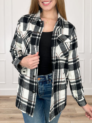 Black and white plaid long-sleeve jacket with button front and chest pockets