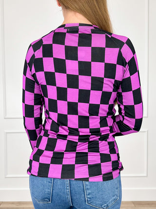 Purple and black checkered long-sleeve pullover top, back view, ruched waist hem