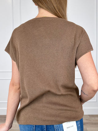 Brown knit cap-sleeve top with back view, short sleeves and hemline at waist