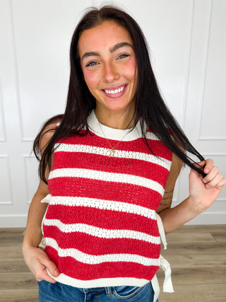 Red and white striped cropped knit sweater vest with ribbed crew neckline