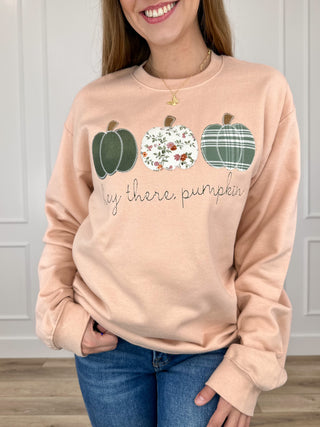 Peach cotton-blend crewneck sweatshirt with pumpkin graphic and cursive slogan