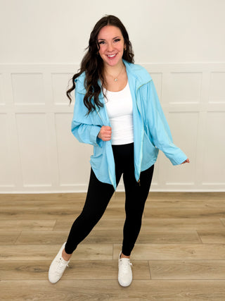 Lightweight hooded long-sleeve jacket in light blue with front zipper