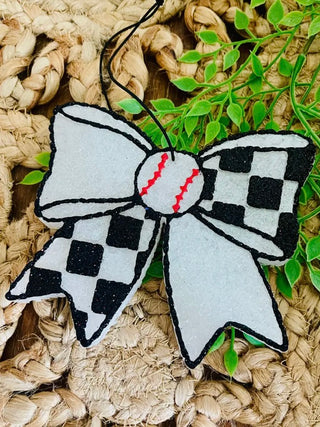 White felt sideline sparkle bow with black checker accents and red center detail