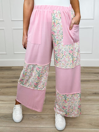 High-rise lightweight bottoms in blush pink with floral patchwork panels