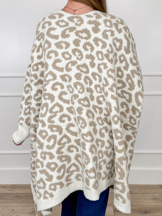 Oversized knit cardigan back view, oat leopard print, long sleeves