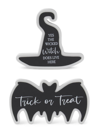 Wooden Halloween decor with witch hat and bat shapes, with spelled sayings