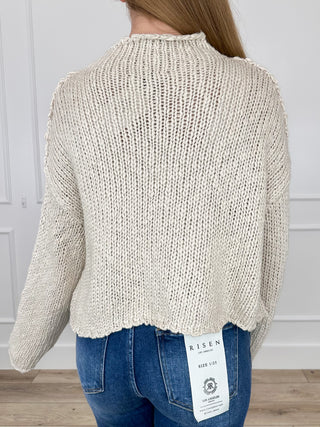 Oat chunky knit cropped sweater back view with long sleeves and high ribbed neck
