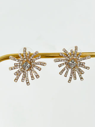 Gold stud earrings with clear crystal starburst flowers, small rhinestone petals