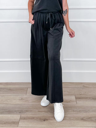 Stormy charcoal high-rise wide-leg pants with drawstring waist and side cargo pockets