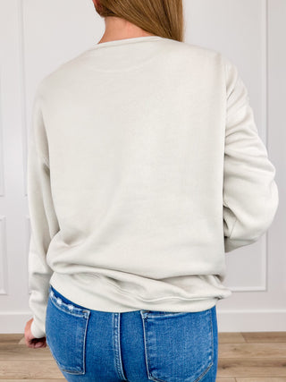 Oat crewneck sweatshirt with long sleeves and ribbed hem, back view