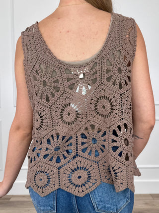 Brown crochet tank top back with scalloped scoop neck and circular mandala motifs