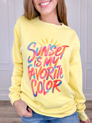 Yellow crewneck sweatshirt with colorful Sunset graphic text