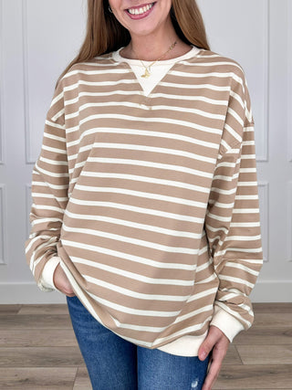 Ribbed long-sleeve henley striped top in tan and cream with button neckline