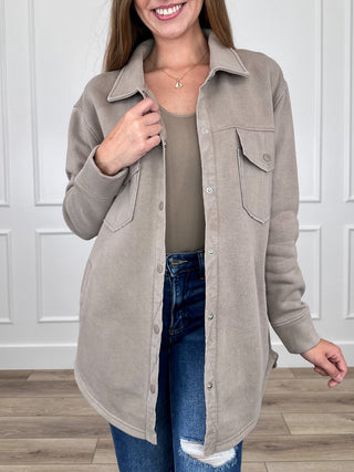 Taupe long-sleeve shacket with point collar, button front, and buttoned chest pockets