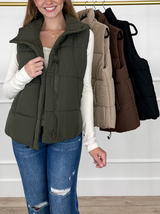 Olive green puffer vest with hood, full zipper front, side pockets