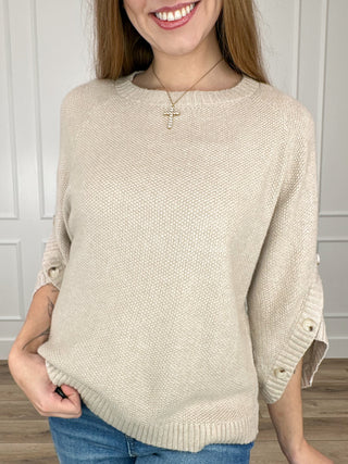 Oat knit 3/4 sleeve sweater, crew neck, ribbed hem and buttoned sleeve cuffs