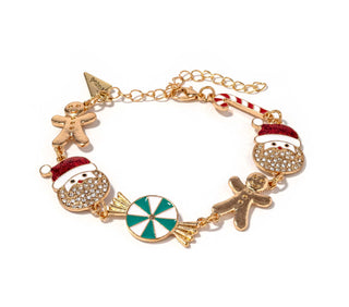 Gold-tone enamel charm bracelet with gingerbread, Santa hat, peppermint, and candy accents
