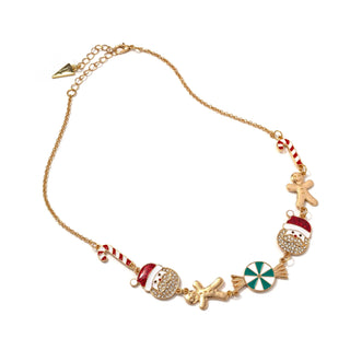 Gold-tone charm necklace with gingerbread man, red striped candy cane and peppermint wheel