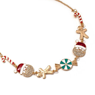 Gold-tone charm necklace with gingerbread man, peppermint wheel, striped candy beads