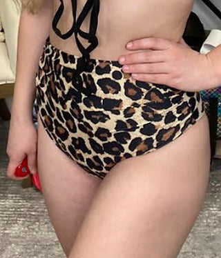 High-rise swim bottoms in leopard print with black side tie detail