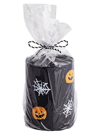 Black Halloween candle in clear bag with spiderweb and jack-o'-lantern prints