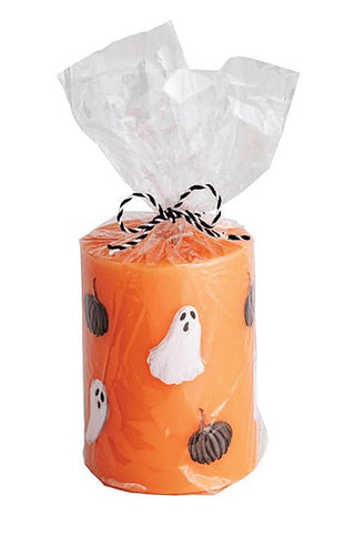 Orange Halloween candle with ghost and pumpkin prints, wrapped in clear bag