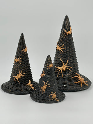 Dark resin witch hat set with orange spider figures, three cone hats