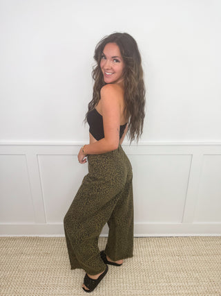 High-rise leopard print barrel jeans in dark olive, relaxed wide-leg fit