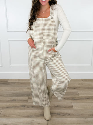Cream cotton plaid overalls with bib front, square neckline, wide-leg pants