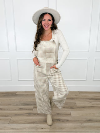 Cream cotton plaid overalls with bib front and shoulder straps, wide-leg pants