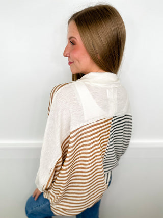 Long sleeve striped cotton-blend top, back view, white with dark and tan stripes