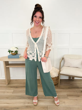 Olive cropped wide-leg jumpsuit with adjustable shoulder straps