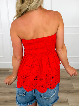 Red lightweight smocked tube top with eyelet peplum, back view