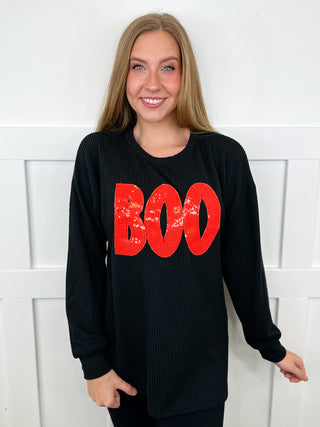 Black ribbed long-sleeve top with red 'BOO' graphic, crew neck.