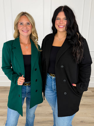 Long-sleeve knit jacket, black and green, double-breasted with buttons.