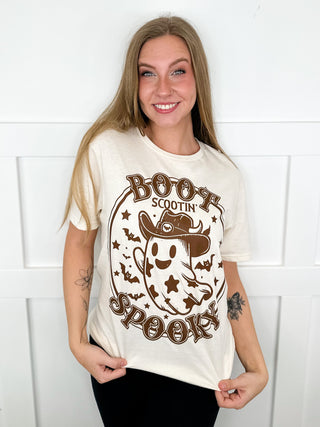 Cream short-sleeve cotton graphic tee with central brown spooky ghost face and stars