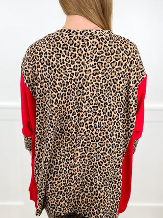 Back view: leopard print ribbed short-sleeve top with crew neck