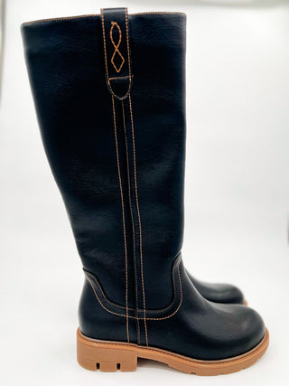 Black faux leather knee-high pull-on boots with decorative front stitching and panel
