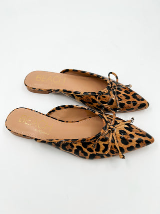 Leopard faux leather mules with bow detail and pointed toe, flat slip-on sole